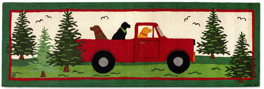 dog area rug with labradors in a red truck